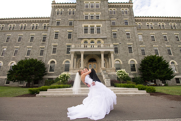 Wedding Portrait with a dip and a kiss.
